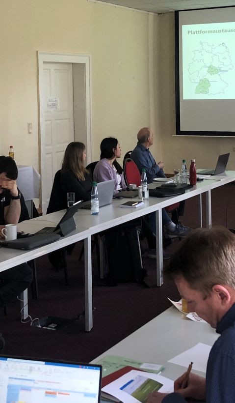 participants listening to presentation